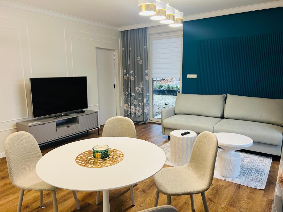 Apartamenty Sosnowe przy Basenach Tropikalnych, Ładowarka do elektryków, Faktura, Parking