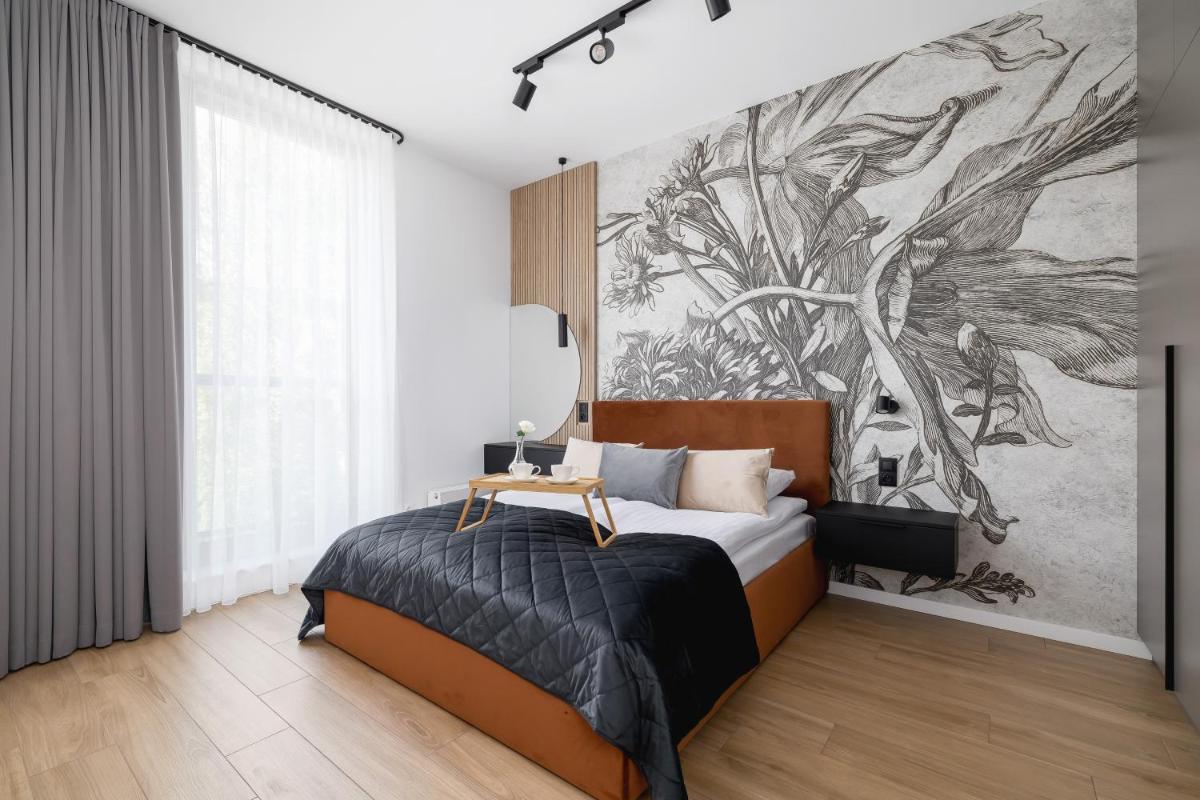 Apartment with access to Sauna and Gym in the Centre by Noclegi Renters