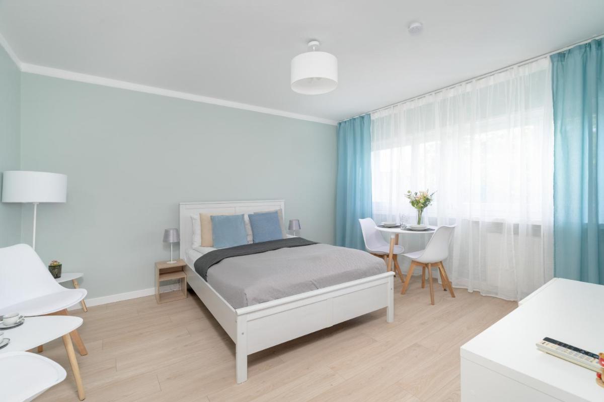 Bukowska Elegancki Apartament z 1 Sypialnią i Biurkiem by Renters