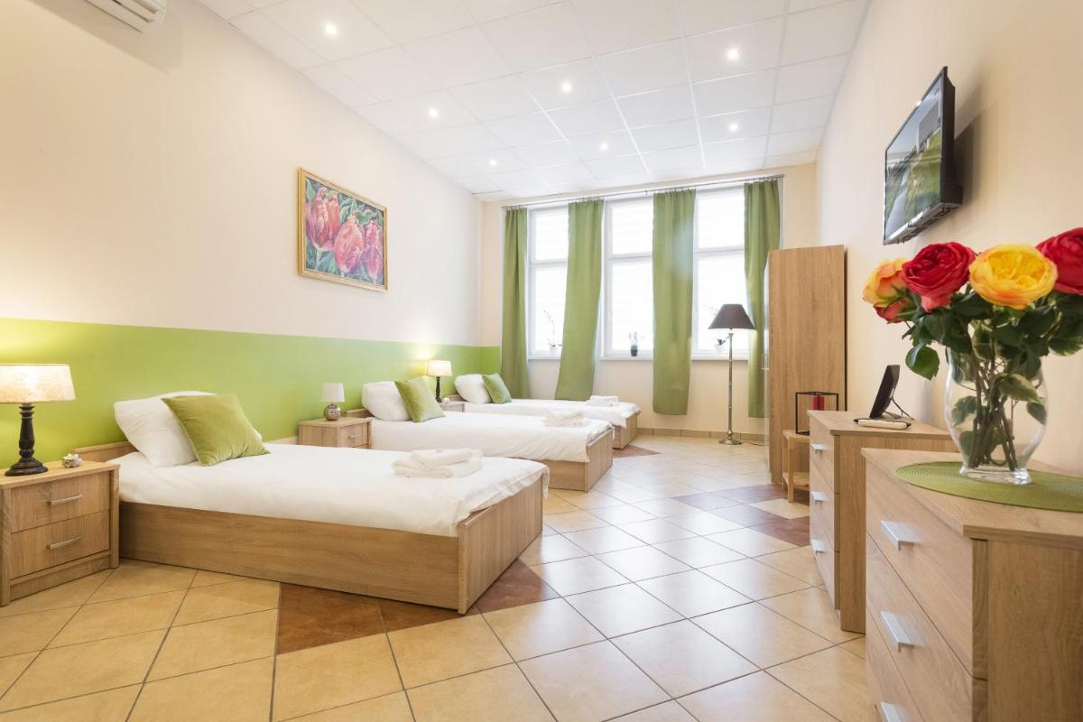 Downtown Shopping Street Family Apartments Półwiejska by Renters