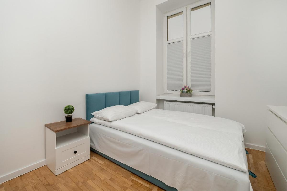 Komfortowy Apartament przy Piotrkowskiej w Łodzi by Renters