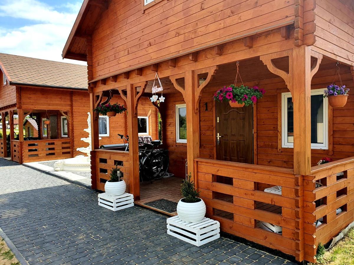 Noclegi "LAS WYPAS" - 1 domek drewniany całoroczny dla 8 osób, 1 domek drewniany całoroczny dla 6 osób, Apartament dla Dwojga oraz Apartament Leśny dla 3 osób