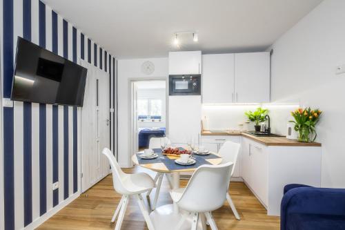 Apartament 1B Niebieskie Apartamenty Poddąbie dawniej Blue Marine z basenem krytym, odkrytym, salą zabaw, animacjami