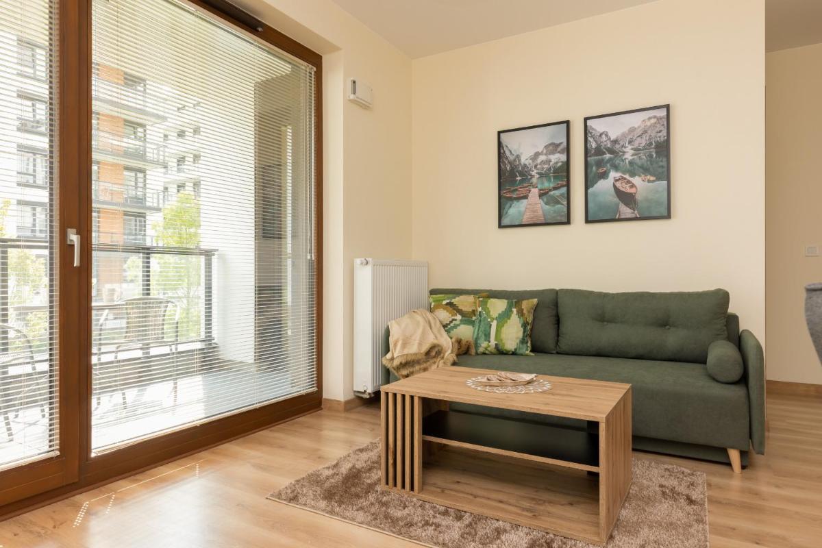 Cosy Apartment Białej Floty with Parking by Noclegi Renters