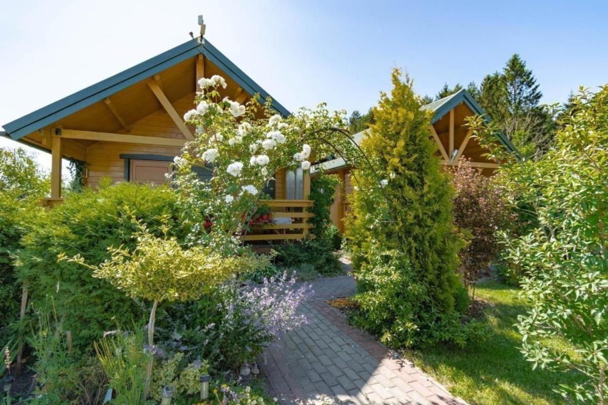 Ferienhaus in Gmina Postomino mit Garten und Terrasse