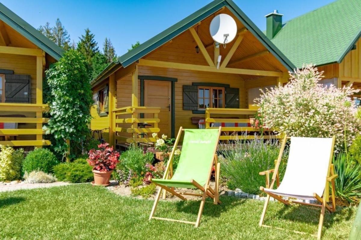Ferienhaus in Rusinowo mit Grill, Terrasse und Garten
