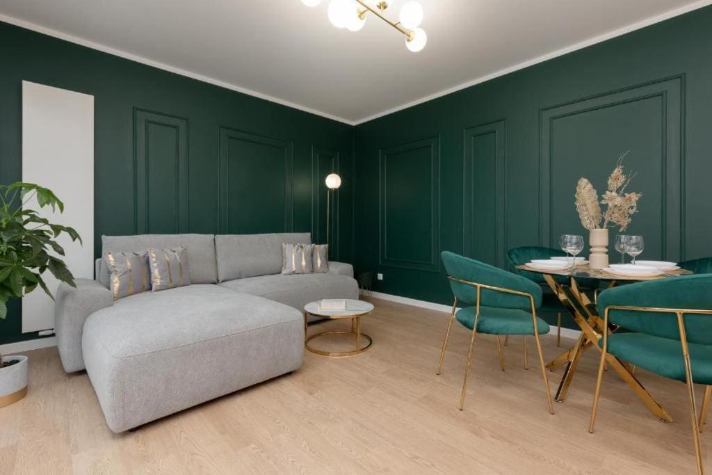 Green apartment in Warsaw's Bemowo district with a garden and double garage