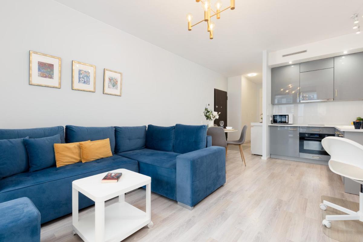 Grzybowska Apartment with Air Conditioning & Balcony Warsaw by Noclegi Renters
