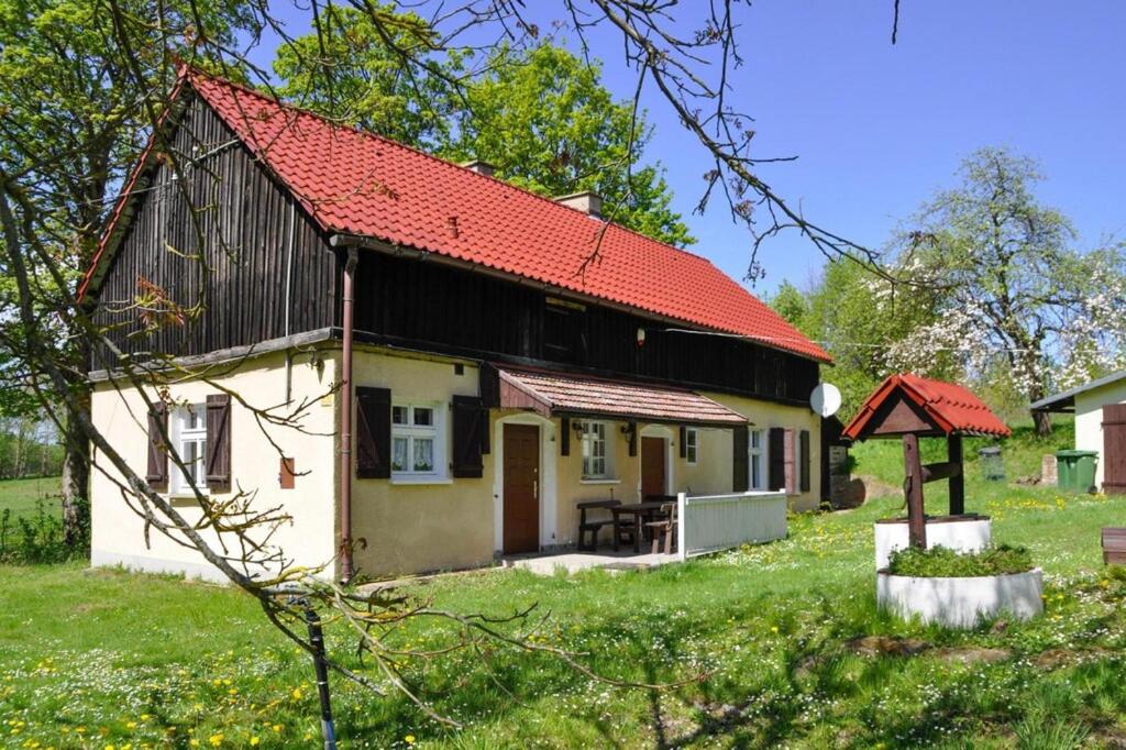 Rural holiday home with fireplace, Grabczyn