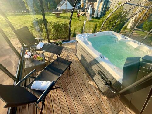 Osada Skoczkowo komfortowe domki z jacuzzi nad jeziorem- sauna- balia- prywatny staw wędkarski