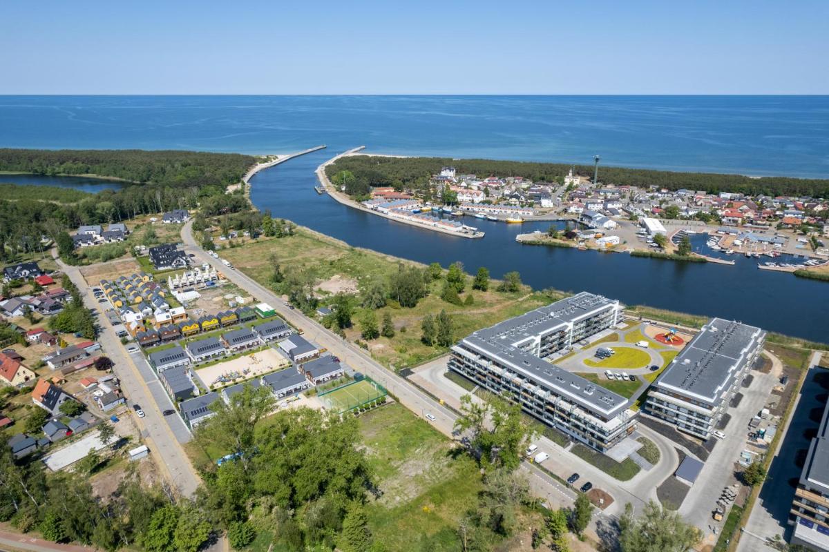 Wellness & SPA Resort Dziwnów Riverfront Apartments with Parking by Noclegi Renters