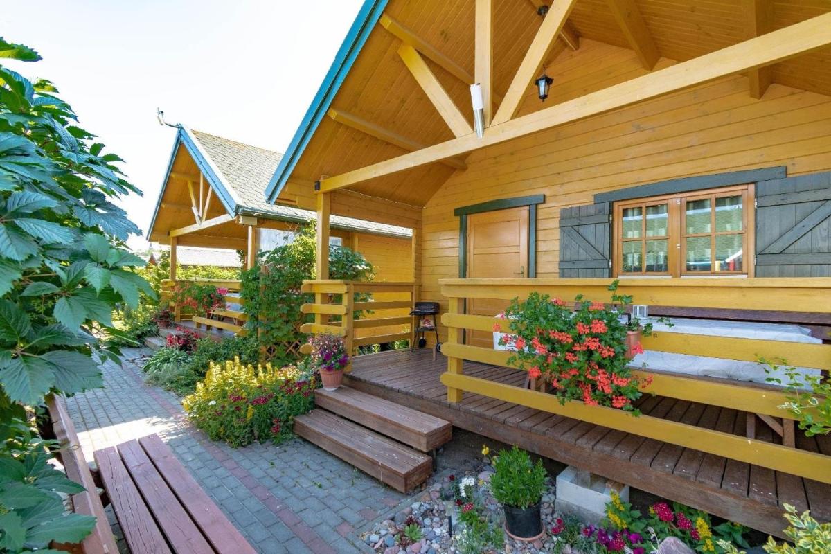 Tolles Ferienhaus in Gmina Postomino mit Grill, Terrasse und Garten