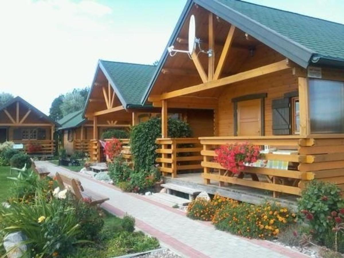 Ferienhaus in Gmina Postomino mit Terrasse, Garten und Grill